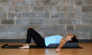 Savasana Variations for deeper relaxation - Restorative Yoga - Supta feet on the floor with Bolster